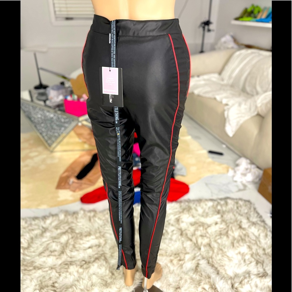 Black faux leather red and black pants